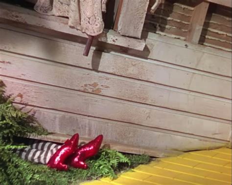 Witch is flattened by house in Wizard of Oz